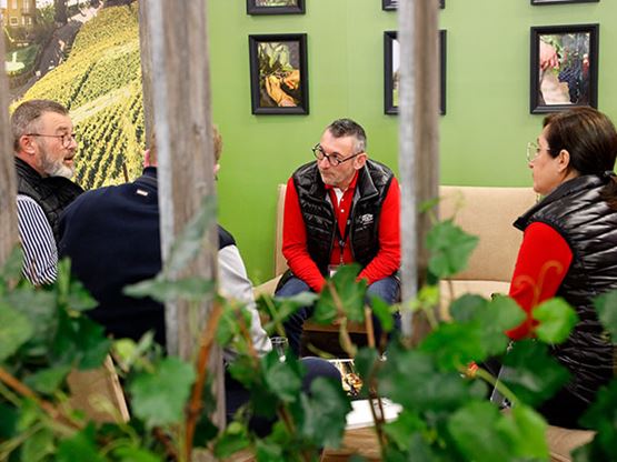 People chatting at a job dating event